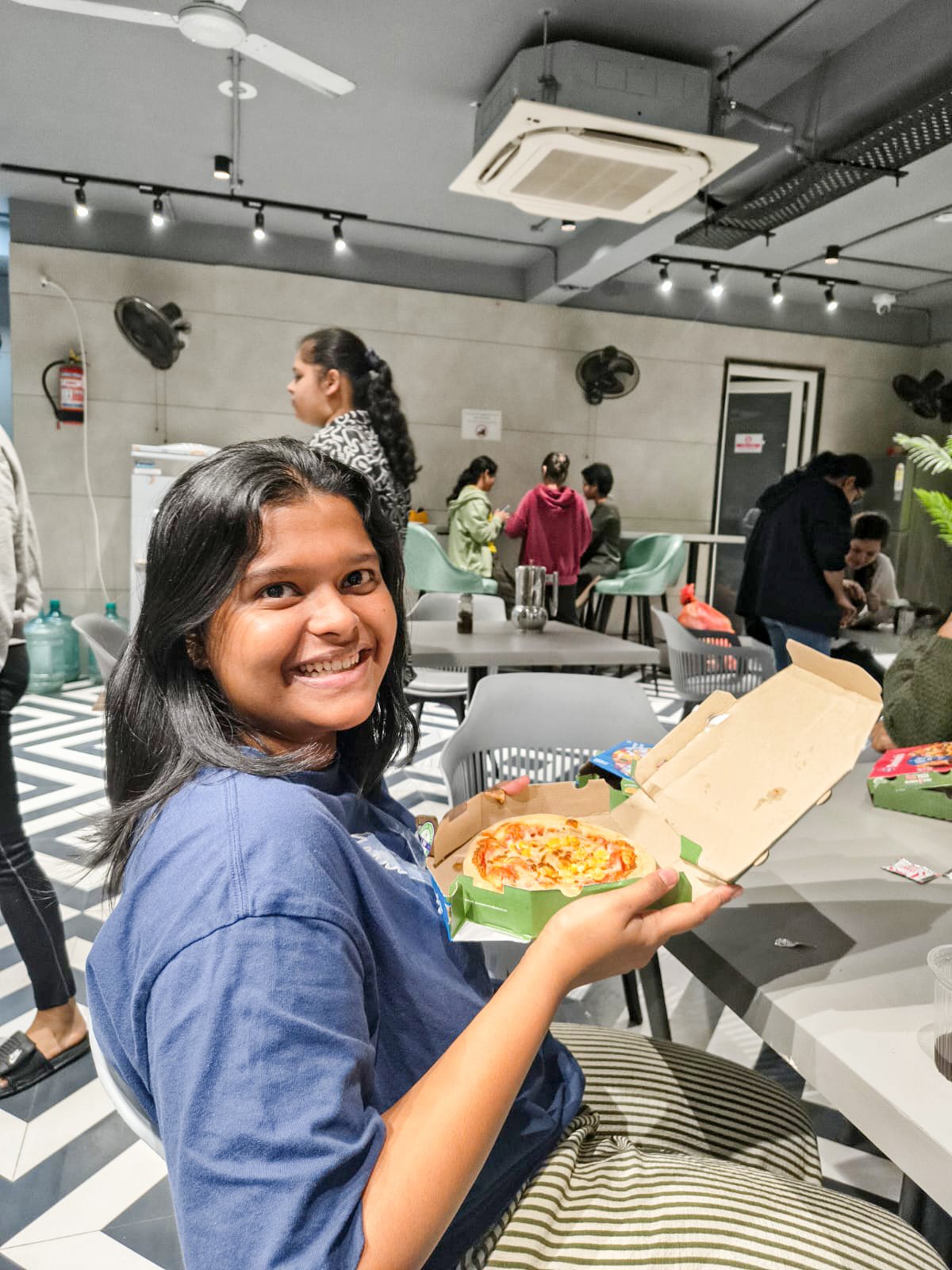 Residents enjoying pizza party
