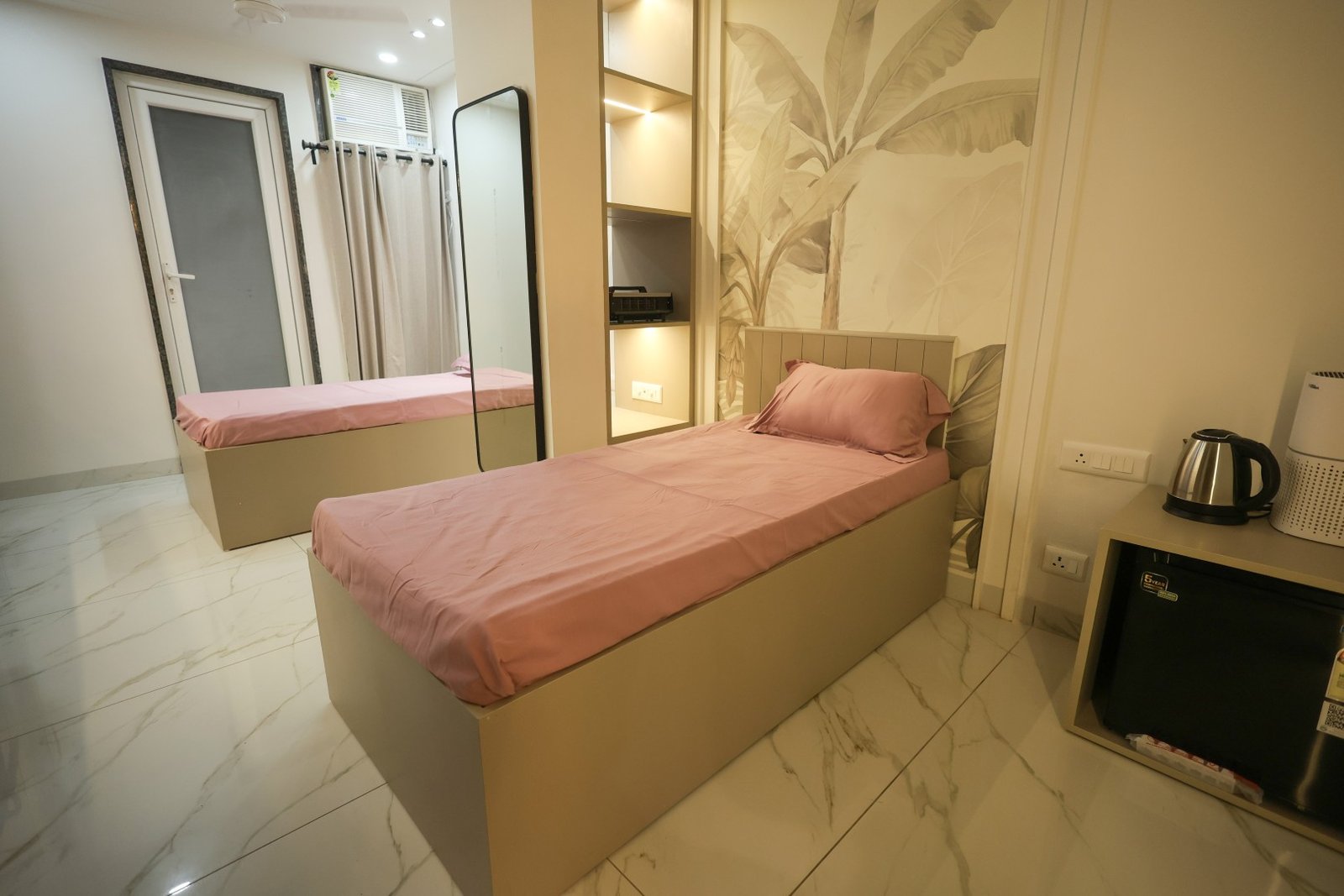 Room 1 — Aspiro Living, premium girls PG in Karol Bagh